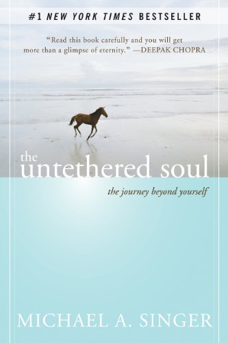 Front cover of the book, "The Untethered Soul" by Michael A. Singer with an image of a horse running freely at a beach